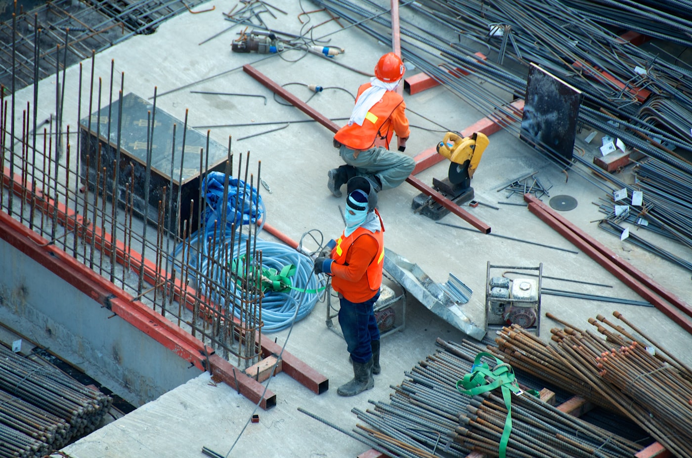 Construction crew working with rebar on a job site